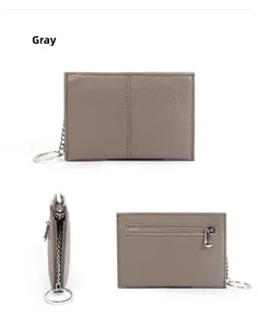 Detailed views of grey pebble leather coin purse with zipper pocket and key ring