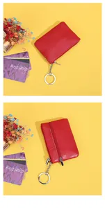 Macro shot of red pebble grain leather coin purse with silver zipper and key ring chain