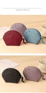 Detailansicht der katzenförmigen Leder-Geldbörsen in Burgund, Lila, Blau und Schwarz