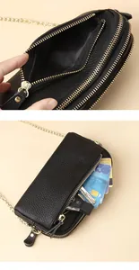 Detail view of black lychee leather crossbody bag with double zipper and card slots
