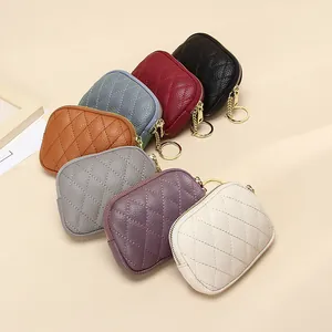 Mini monedero de cuero acolchado con cremallera y llavero en múltiples colores vivos