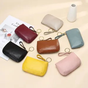Monederos de cuero genuino con cremallera y llavero disponibles en siete colores