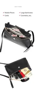 Interior view of black litchi leather crossbody bag showing spacious capacity and pockets