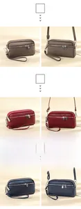 Dettaglio borse in vera pelle color cachi, rosso vino e blu scuro con tripla zip in metallo