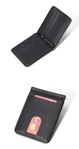 Detailed macro view of black pebble grain leather wallet with silver money clip and card slots
