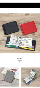 Detail of slim money clip wallets in black, red, and gray with litchi grain texture