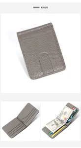 Macro view of khaki litchi grain leather wallet featuring stainless steel money clip and slots