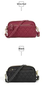 Detail of wine red and black leather crossbody bags with rhombic quilting and gold hardware