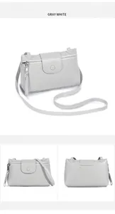 Detailed views of gray-white pebble leather crossbody bag with multiple zip pockets