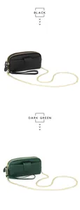 Detail of black and dark green leather phone wallets with chain straps and wristlets