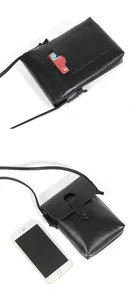 Detail van zwart lederen telefoontasje met achterkaartsleuf en interne opbergruimte