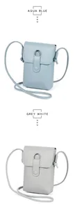 Detailopname van getextureerde lederen telefoontasjes in aqua blauw en grijs wit