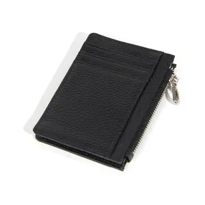 Minimalist genuine leather card holder in black with three slots and a side zipper
