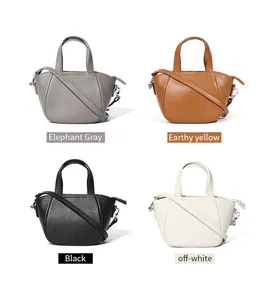 Bolsos bandolera de piel de vaca en cuatro colores con correas desmontables