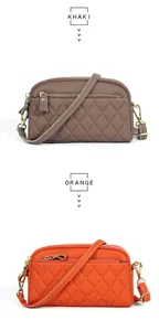 Detailed comparison of khaki and orange quilted leather bags with multi-zipper layers
