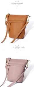 Detailansicht der Leder-Eimertaschen in Gelbbraun und Lotus-Lila mit weißen Kontrastnähten