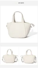 Detalle de bolso de mano en cuero granulado blanco crema con herrajes plateados y asas