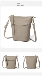 Drei-Ansichten-Detail der hellgrauen Leder-Eimertasche mit Kontrastnähten und Metallteilen
