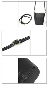 Details einer schwarzen Bucket Bag aus Leder mit weißen Kontrastnähten und Goldbeschlägen
