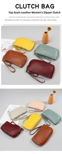 Detailed close-up of premium pebbled leather texture on spacious zip-around clutch wallets