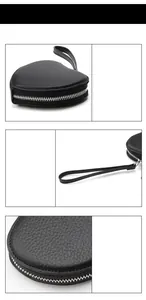 Makro-Detail der herzförmigen Leder-Geldbörse mit Lychee-Maserung und Reißverschluss