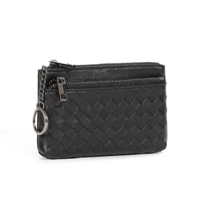 Hand-woven black leather coin purse with classic weave pattern and keychain ring