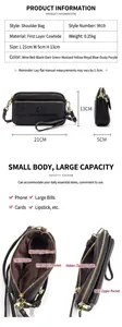 Detail view of premium leather shoulder bag with dimensions 21x5x13cm and internal pockets
