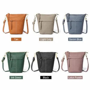 Minimalistische Leder-Beuteltaschen in sechs Farben mit Narbenleder und verstellbarem Gurt