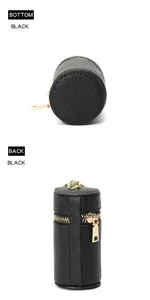Vue détaillée du bas et du dos du mini sac à monnaie noir en cuir de vachette grainé