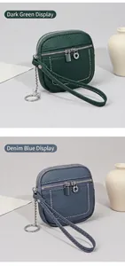 Mini pochette in pelle verde scuro e blu denim con cinturino da polso e portachiavi