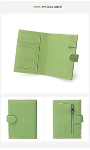 Macro detail of avocado green lychee grain leather wallet with card slots and zip pocket