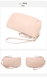 Detailed views of pink pebbled leather wristlet clutch with secure gold zipper closure