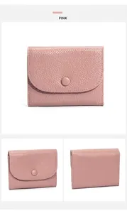 Dettaglio del mini portafoglio in vera pelle rosa con trama a grana e bottone