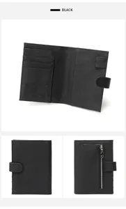 Macro detail of black pebble leather wallet with multi-card slots and zippered pocket