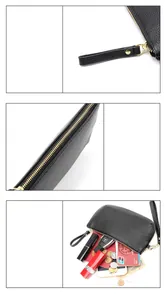 Detail of black pebbled leather clutch showing large capacity for cards and phone