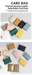 Detail view of multi-color genuine leather card holders with litchi grain and metal snap
