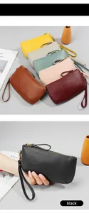 Litchi pattern leather wristlet clutch with secure metal zipper and detachable strap