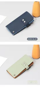 Détails de portefeuilles en cuir véritable bleu foncé et vert menthe avec bouton argent