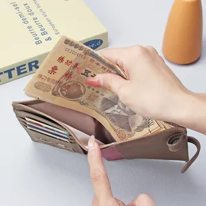 Brown leather RFID passport wallet with multiple card slots and slim bi-fold design