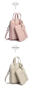 Close-up of litchi texture on vertical leather crossbody bag and round coin purse