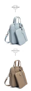 Vertical detail of Alice Blue and Windcoat Grey cowhide crossbody bag with coin purse