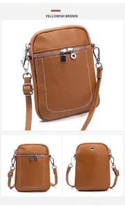 Dettaglio borsa porta cellulare in pelle marrone giallastro con cuciture a contrasto e zip