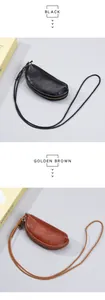 Mini pochette a luna in vera pelle nera e marrone dorato con laccetti da collo