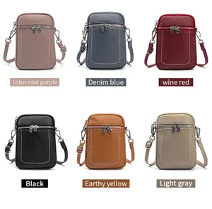 Selection of compact leather crossbody phone bags in six versatile colors with white stitching