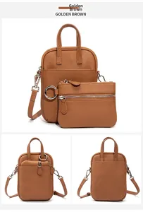 Detail of golden brown lychee grain leather crossbody phone bag with matching coin purse