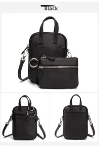Detail of black pebbled leather crossbody phone bag with matching detachable coin purse
