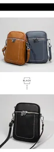 Detailed view of leather phone bags with contrast stitching and silver metal zippers