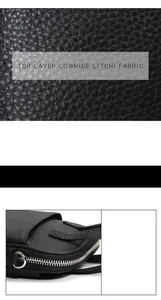 Detail of top layer cowhide litchi fabric texture and silver metal zipper on black bag