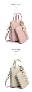 Detail view of leather crossbody bag sets in Peony Pink and Off-White with coin pouches