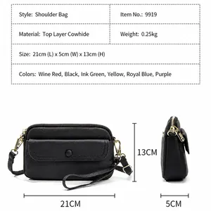 Minimalist black genuine leather shoulder bag with adjustable strap and 21cm size guide
